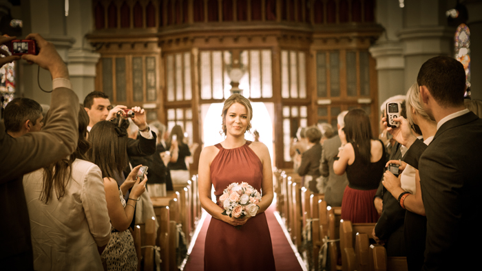 bridesmaids walking up aisle